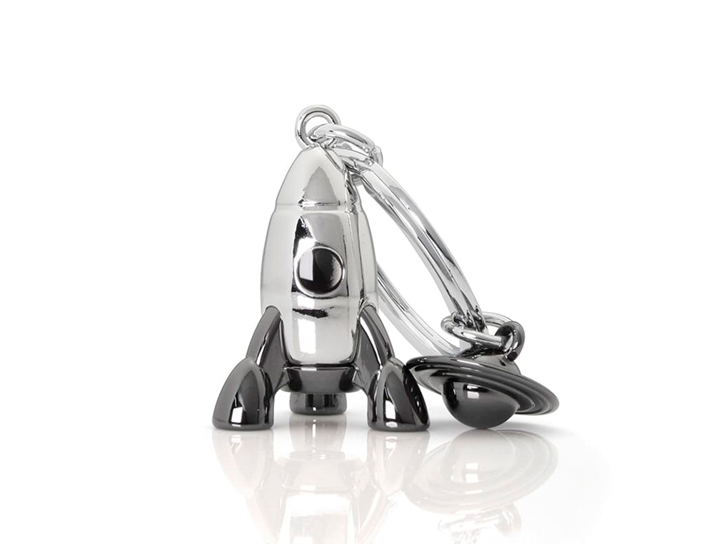 LLAVERO DBRANDS METALMORPHOSE TRAVEL COHETE
