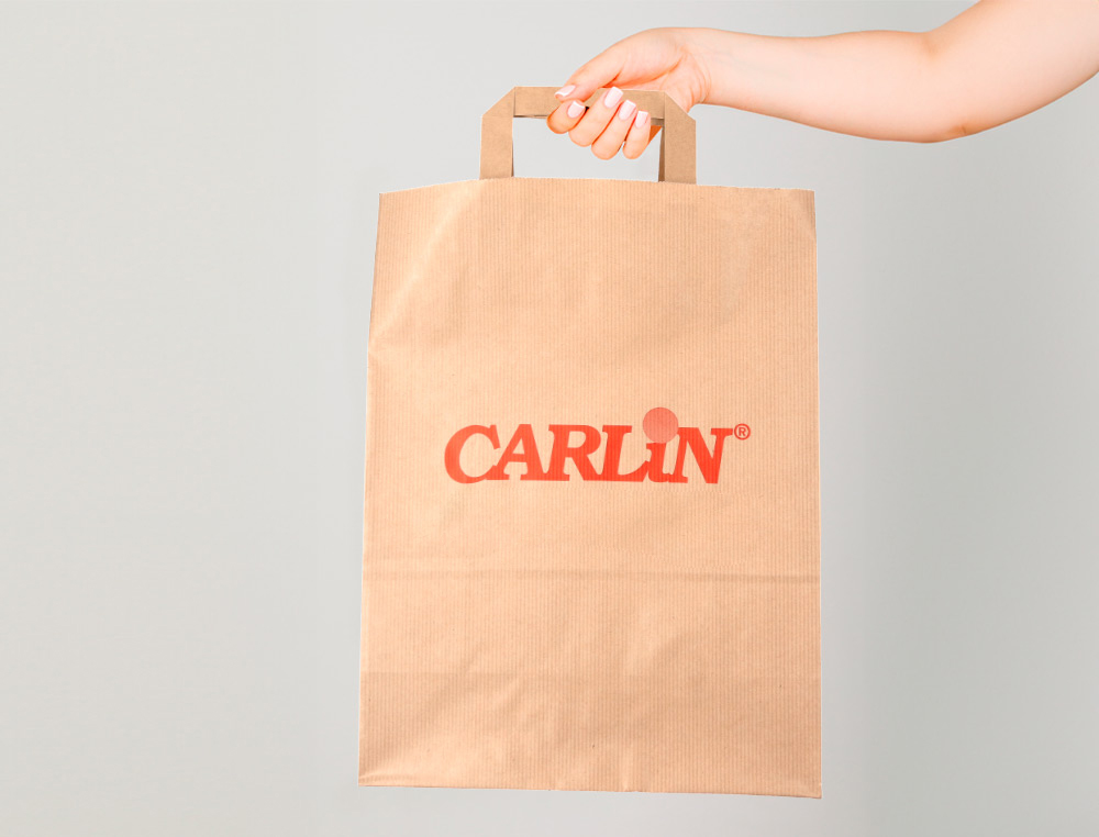 BOLSA KRAFT VERJURADO ASA PLANA CARLIN 32X12X41 CM 90 GR CAJA DE 250 UNIDADES